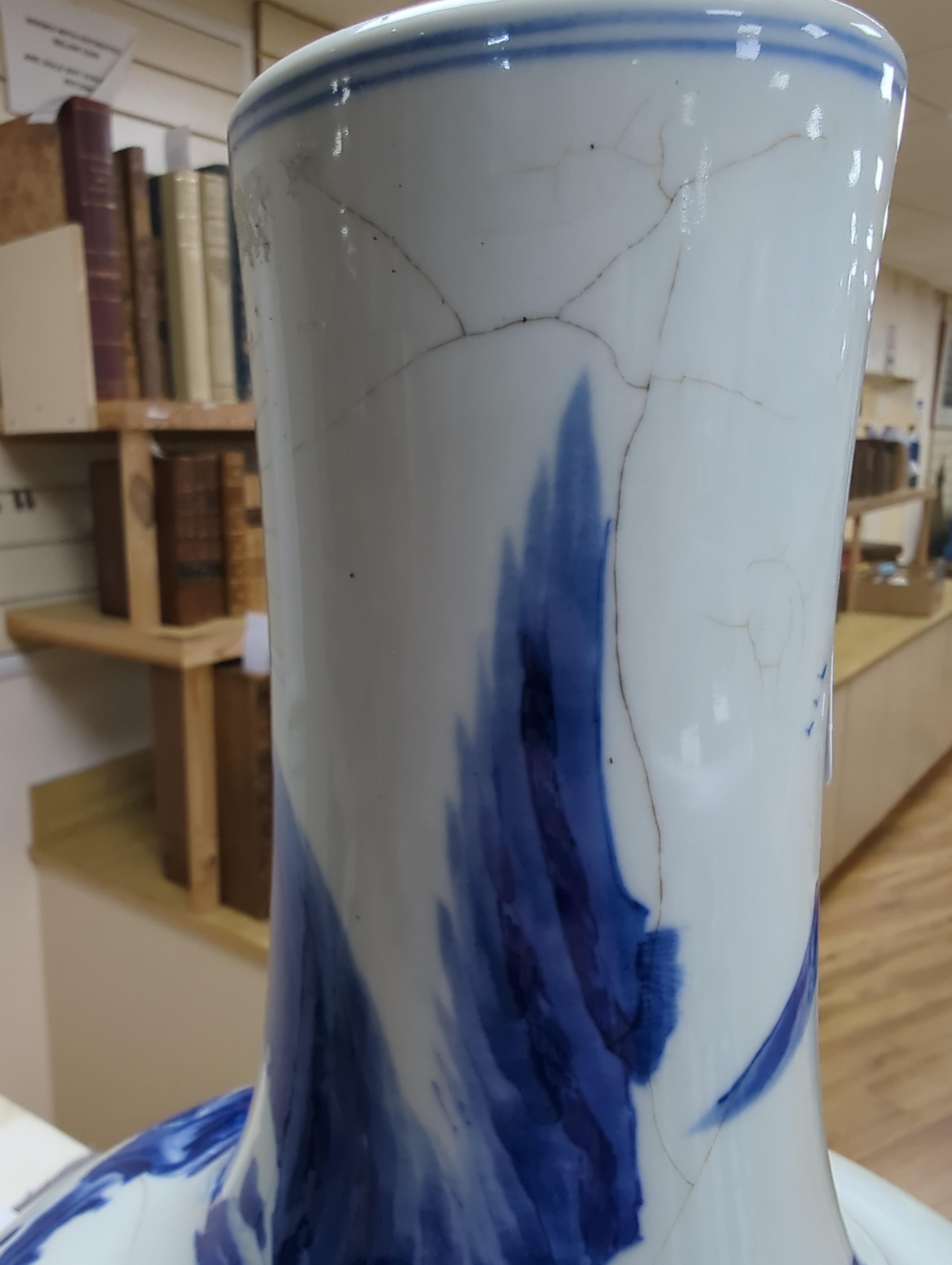 A large Chinese blue and white bottle vase, (a.f) 45cm